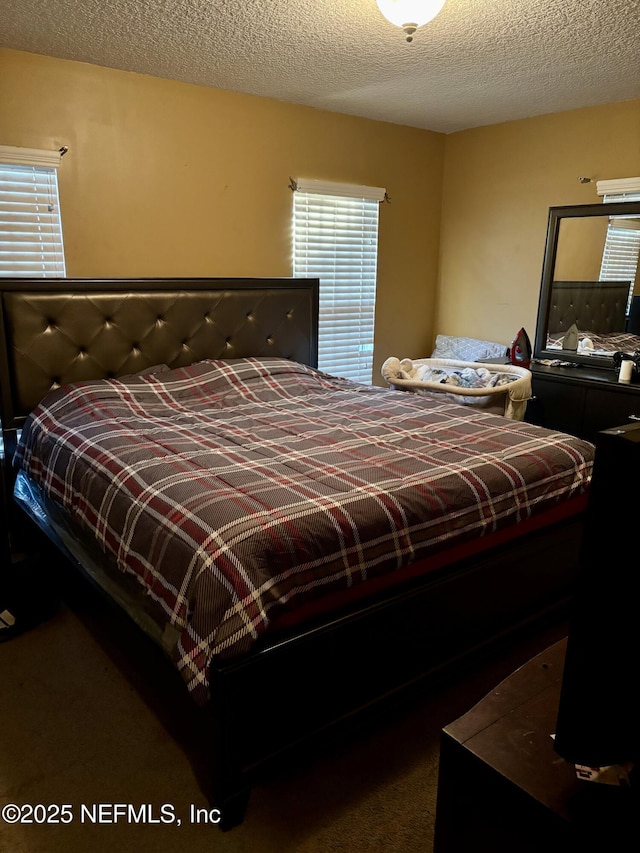 bedroom with a textured ceiling