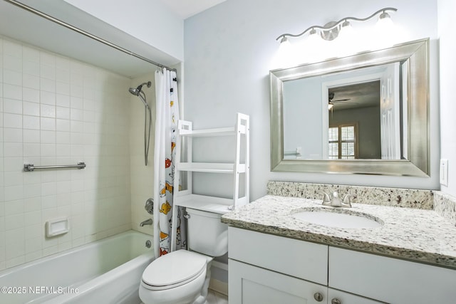 full bathroom with shower / tub combo with curtain, vanity, and toilet