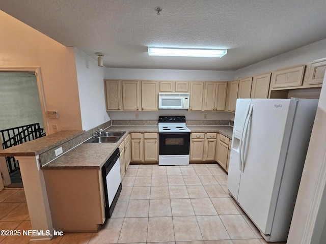 kitchen with light brown cabinetry, a peninsula, light tile patterned flooring, white appliances, and a sink