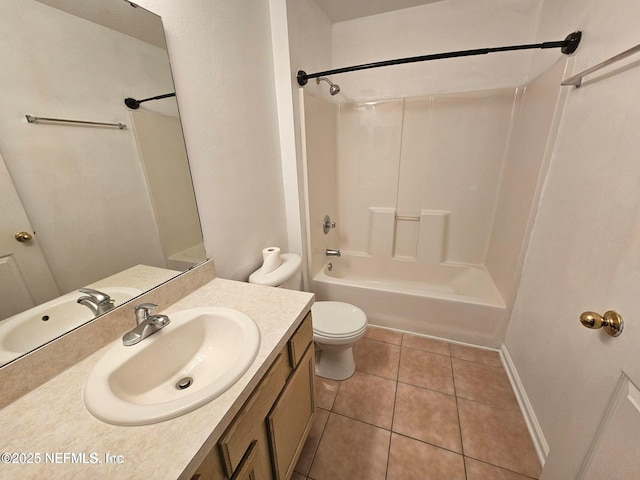 bathroom with tile patterned floors, bathing tub / shower combination, toilet, and vanity