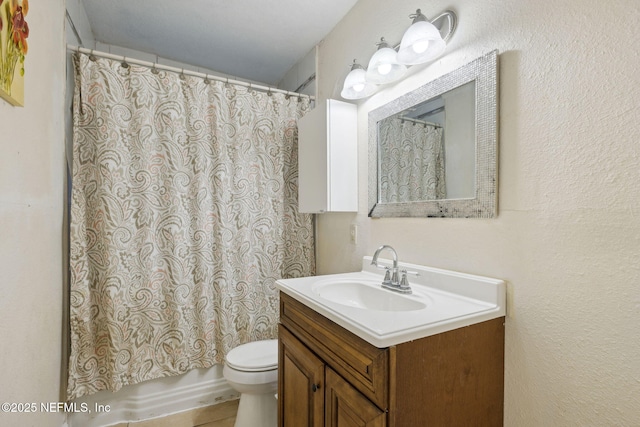 full bath with toilet and vanity