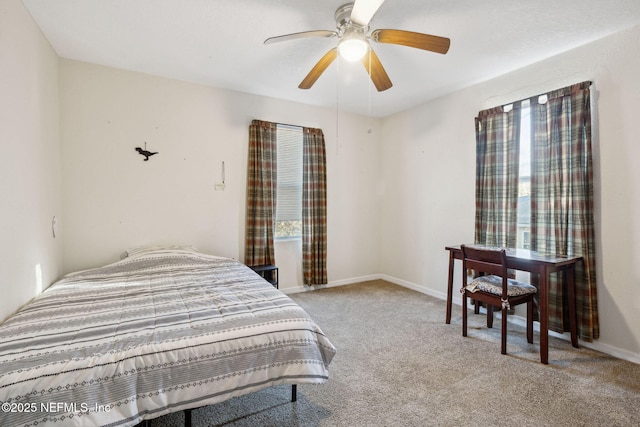 bedroom featuring baseboards, carpet, and a ceiling fan