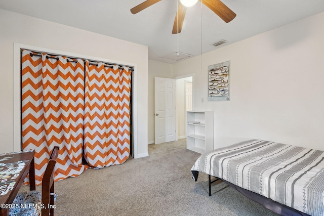 bedroom featuring visible vents, ceiling fan, and carpet floors