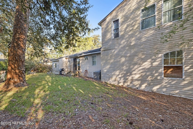 view of yard with entry steps