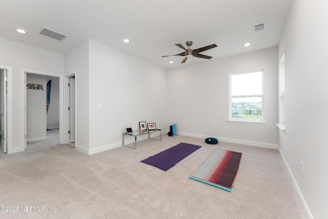 exercise room with recessed lighting, a ceiling fan, and visible vents