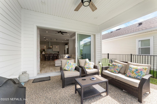 view of patio / terrace featuring ceiling fan and outdoor lounge area