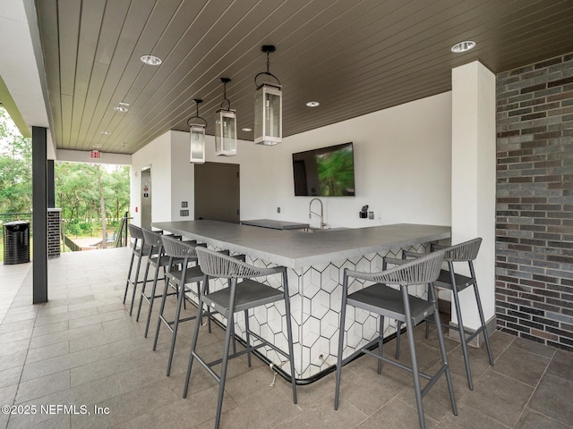 view of patio featuring outdoor wet bar