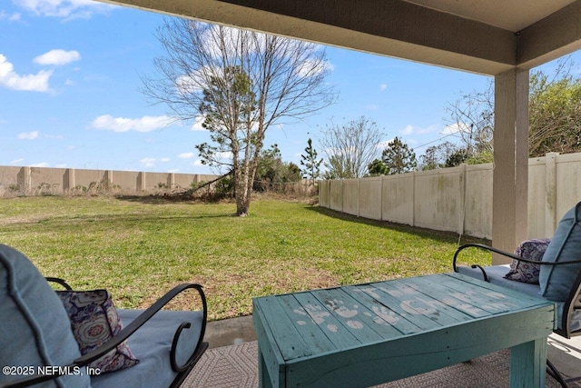 view of yard with a fenced backyard