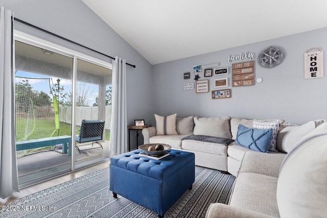 living area with lofted ceiling