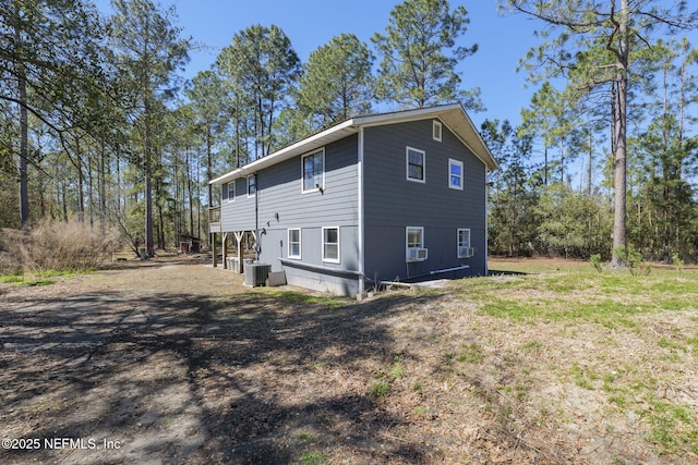 view of home's exterior featuring cooling unit