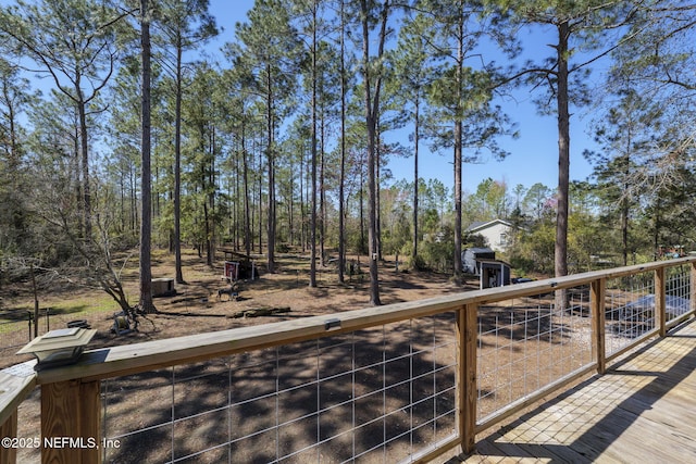 deck featuring an outdoor structure