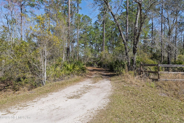 view of street featuring a view of trees