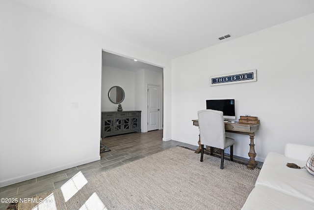 2965 Crossfield Dr, Green Cove Springs, FL 32043 - office area featuring visible vents, baseboards, and wood finish floors