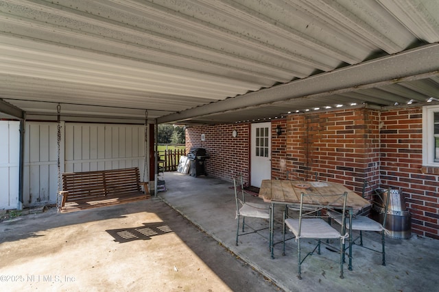 view of patio featuring outdoor dining area