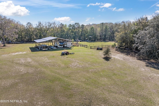 aerial view featuring a rural view and a forest view