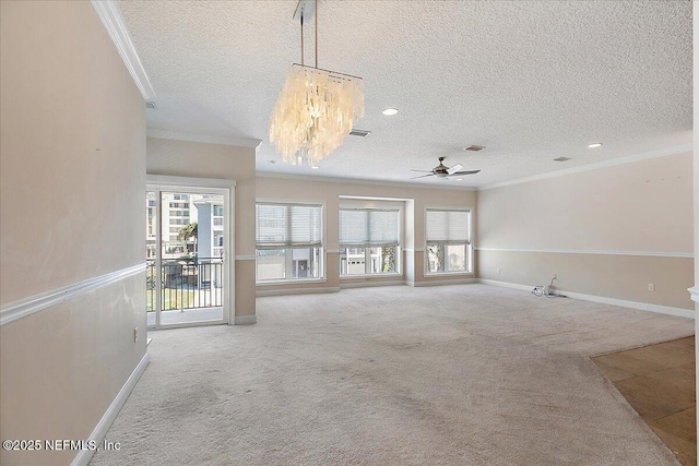 unfurnished living room with baseboards, crown molding, and a ceiling fan