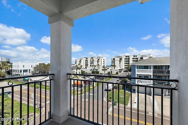 balcony featuring a city view