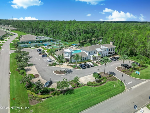 aerial view featuring a forest view