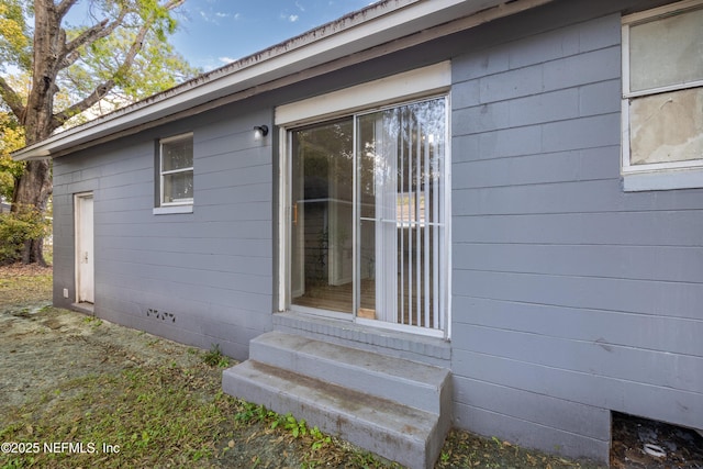 view of property exterior with entry steps