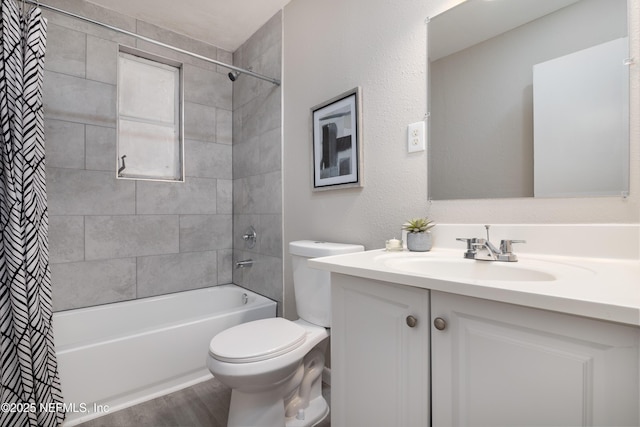 full bathroom with shower / bath combo with shower curtain, toilet, wood finished floors, and vanity