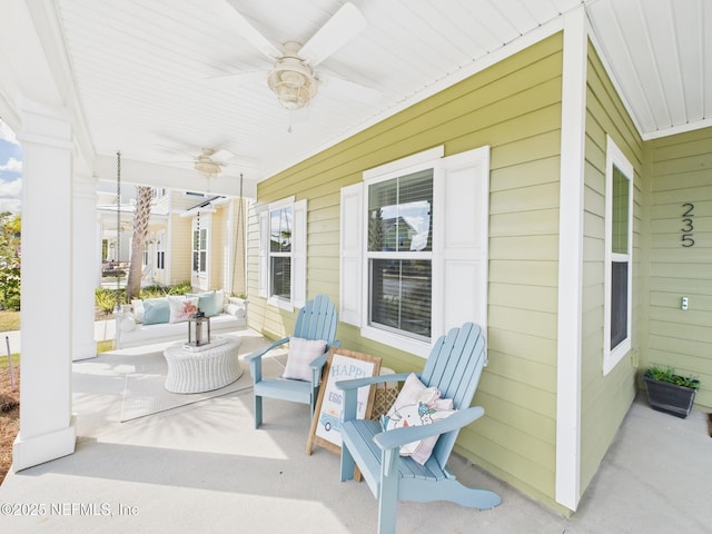 view of patio / terrace with a porch and ceiling fan