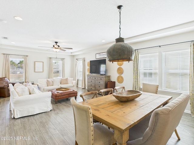 dining area with recessed lighting, light wood-type flooring, visible vents, and ceiling fan