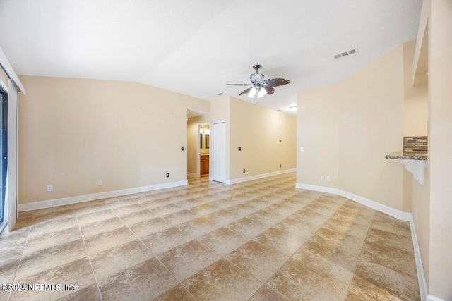 unfurnished room with baseboards, visible vents, a ceiling fan, and lofted ceiling