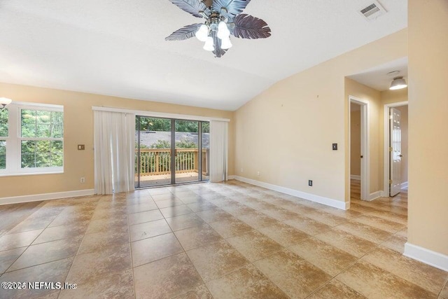 empty room featuring visible vents, baseboards, ceiling fan, and vaulted ceiling