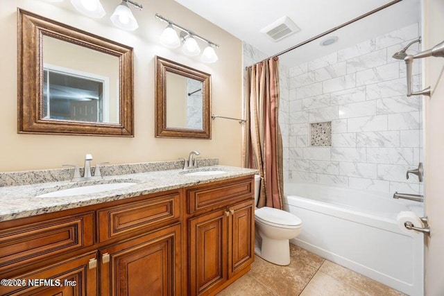 full bathroom featuring a sink, visible vents, toilet, and shower / tub combo with curtain