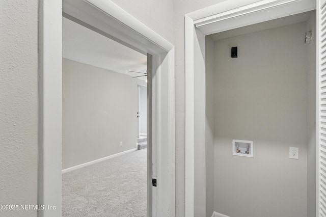 laundry area with baseboards, carpet, laundry area, hookup for a washing machine, and electric dryer hookup