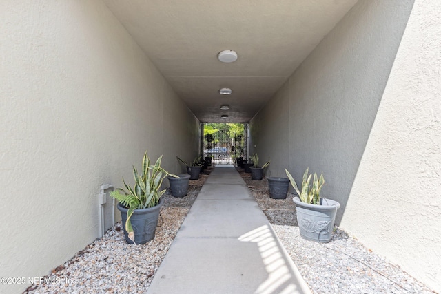 property entrance with stucco siding