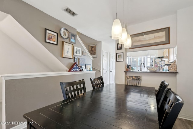 dining room with visible vents