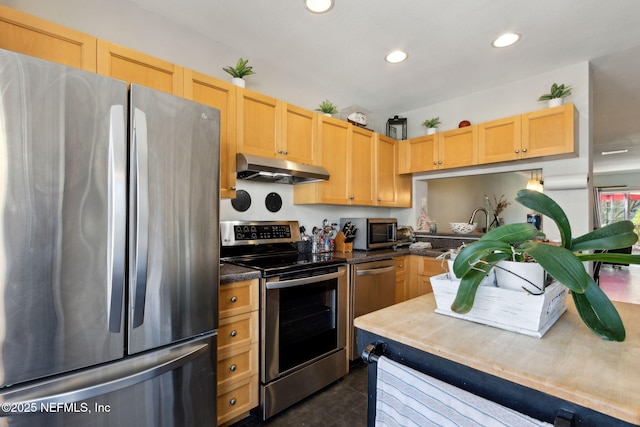 kitchen with light brown cabinets, recessed lighting, appliances with stainless steel finishes, and ventilation hood