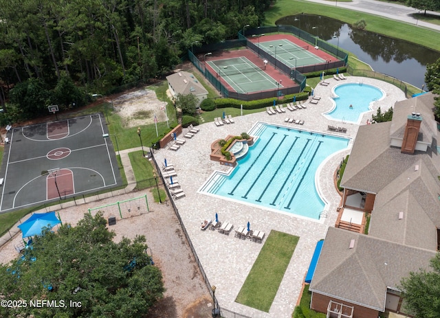 birds eye view of property featuring a water view