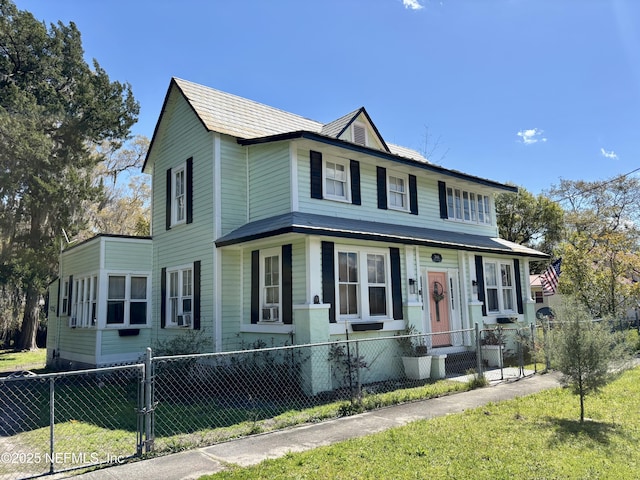 346 N Cherry St, Starke, FL 32091 - view of front of property featuring a front yard and a fenced front yard