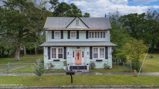 346 N Cherry St, Starke, FL 32091 - view of front of property featuring a gate, a fenced front yard, and a front yard