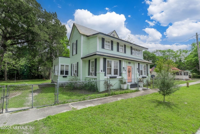346 N Cherry St, Starke, FL 32091 - view of front of home featuring a fenced front yard and a front lawn