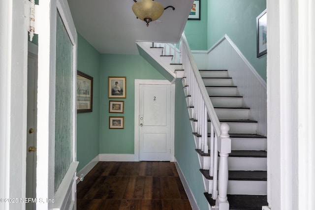346 N Cherry St, Starke, FL 32091 - stairway featuring baseboards and wood finished floors