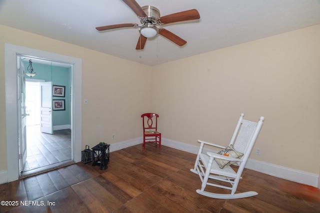 346 N Cherry St, Starke, FL 32091 - unfurnished room with baseboards, a ceiling fan, and wood-type flooring