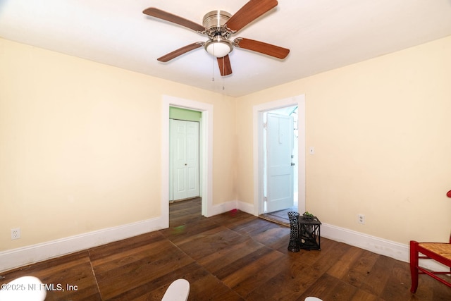 346 N Cherry St, Starke, FL 32091 - spare room featuring hardwood / wood-style floors, a ceiling fan, and baseboards
