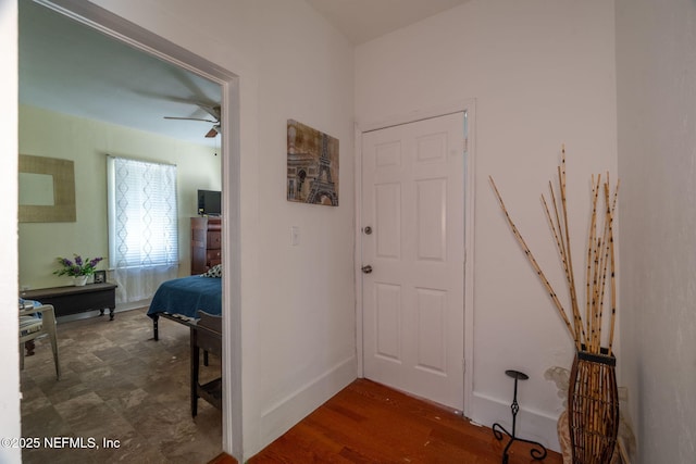 346 N Cherry St, Starke, FL 32091 - hall featuring baseboards and dark wood-type flooring