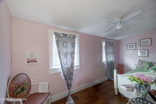 346 N Cherry St, Starke, FL 32091 - bedroom with baseboards, lofted ceiling, wood finished floors, and a ceiling fan