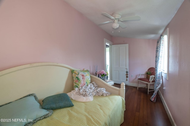 346 N Cherry St, Starke, FL 32091 - bedroom with baseboards, wood finished floors, and a ceiling fan