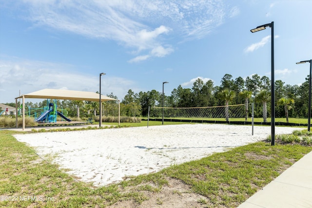 view of home's community with volleyball court and playground community