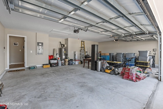 garage featuring water heater, a garage door opener, and electric panel