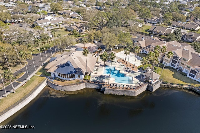 bird's eye view featuring a residential view and a water view