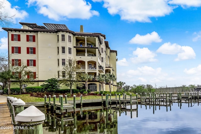 dock area with a water view