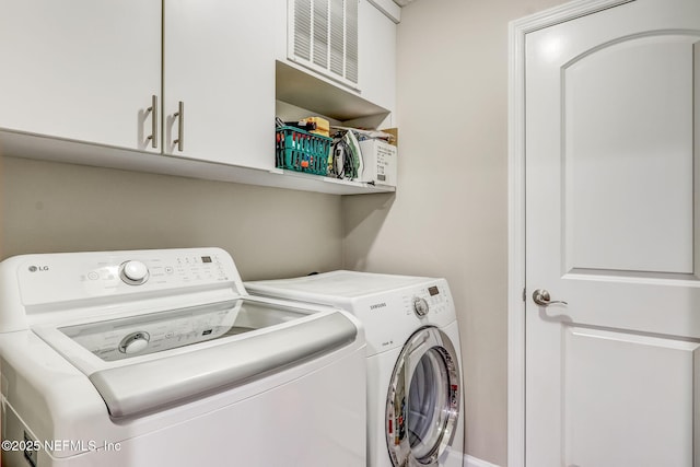 washroom featuring independent washer and dryer