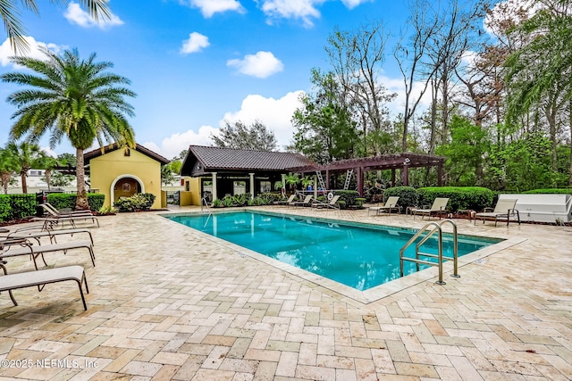 community pool featuring a patio and a pergola