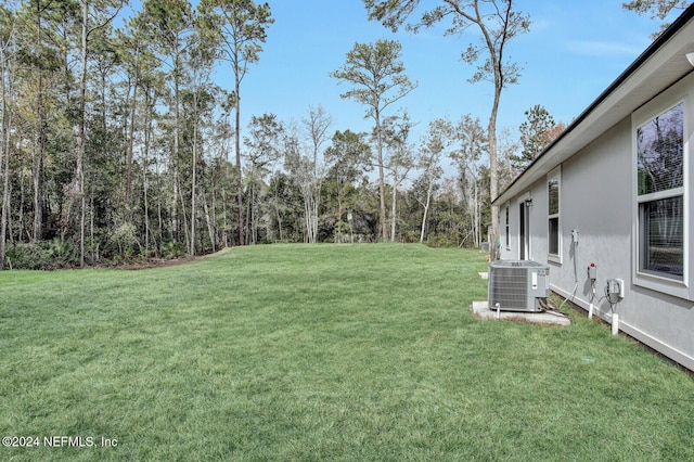 view of yard featuring central AC